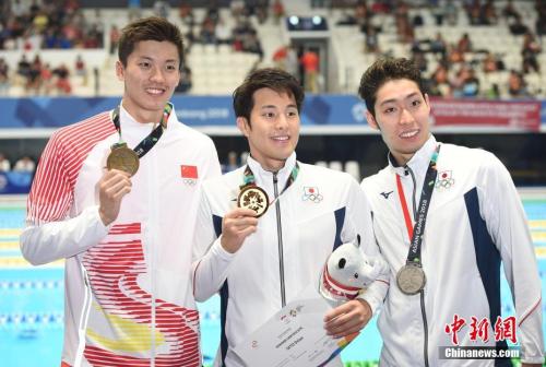 雅加達(dá)亞運(yùn)會(huì)游泳男子400米個(gè)人混合泳決賽，汪順獲得銅牌。(資料圖)<a target='_blank' >中新社</a>記者 侯宇 攝