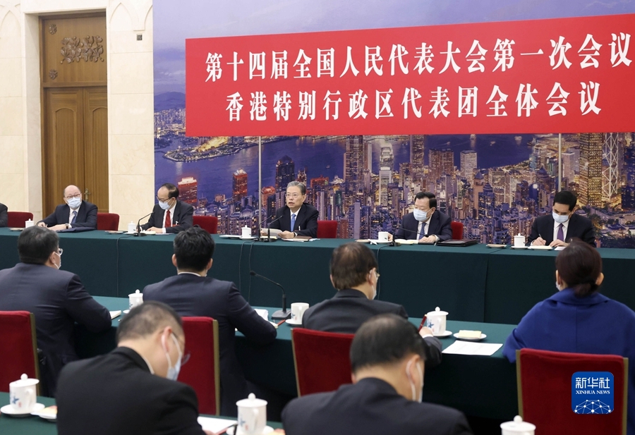 趙樂際分別參加香港代表團(tuán)澳門代表團(tuán)審議