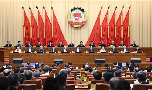 全國政協(xié)十四屆常委會第一次會議開幕 王滬寧出席